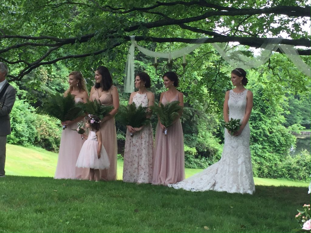 Photo by Ethan Kociela Photography. Lily and her maids underneath the Sweet Birch Tree overlooking the lake at Lakewood Estate.